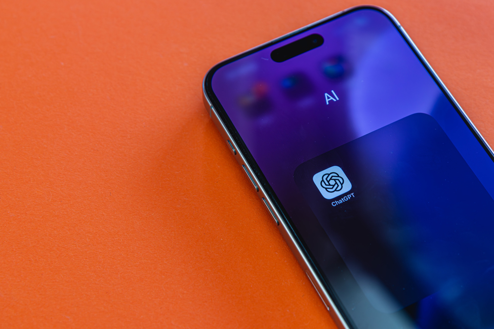 image of a phone and chat gpt icon